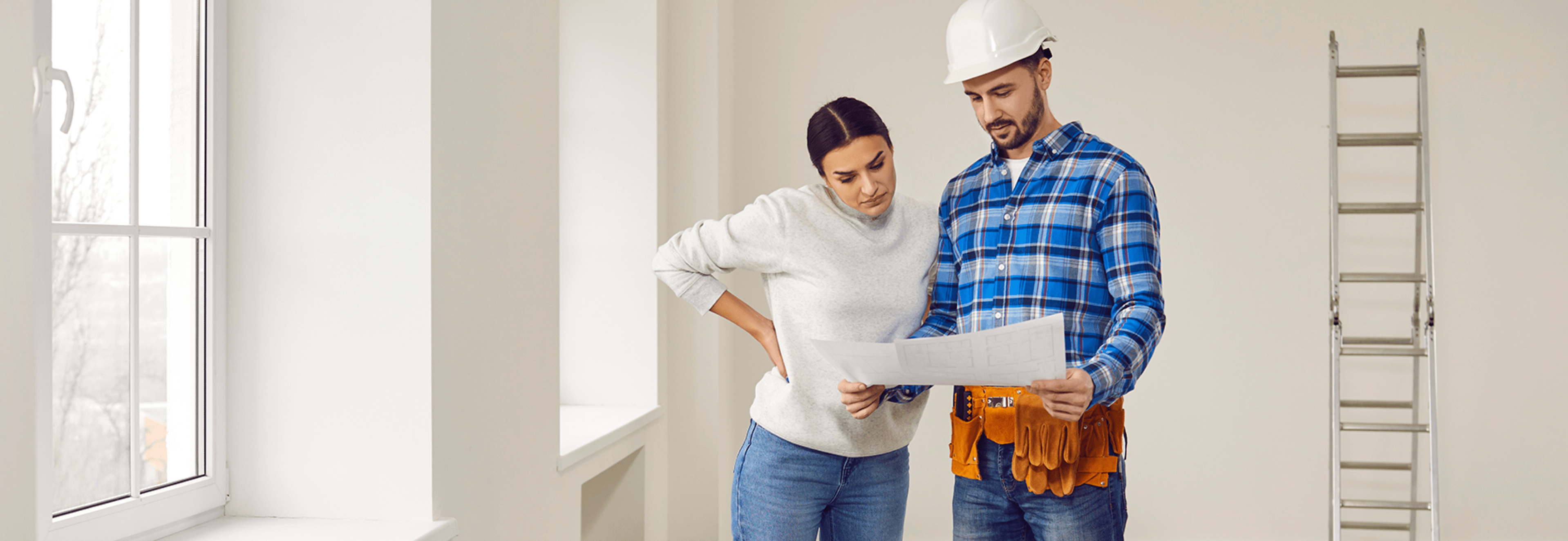Contractors reviewing documents